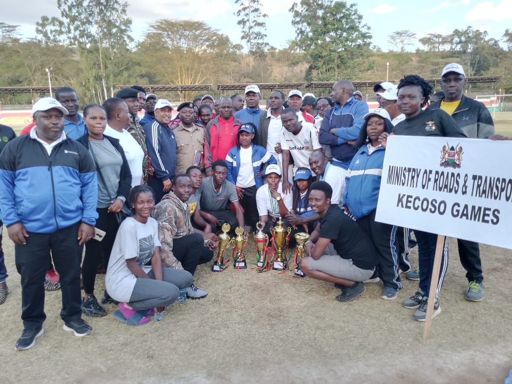 The Ministry of Roads and Transport KECOSO games team during the Closing Ceremony on Saturday 26th August, 2023 in Narok. The Deputy Governor Narok County Tamalinye Koech (at the centre in red), Senior Deputy Secretary Mr. Abdi, Director, Human Resource Management and Development Mr. Sakwa among others.